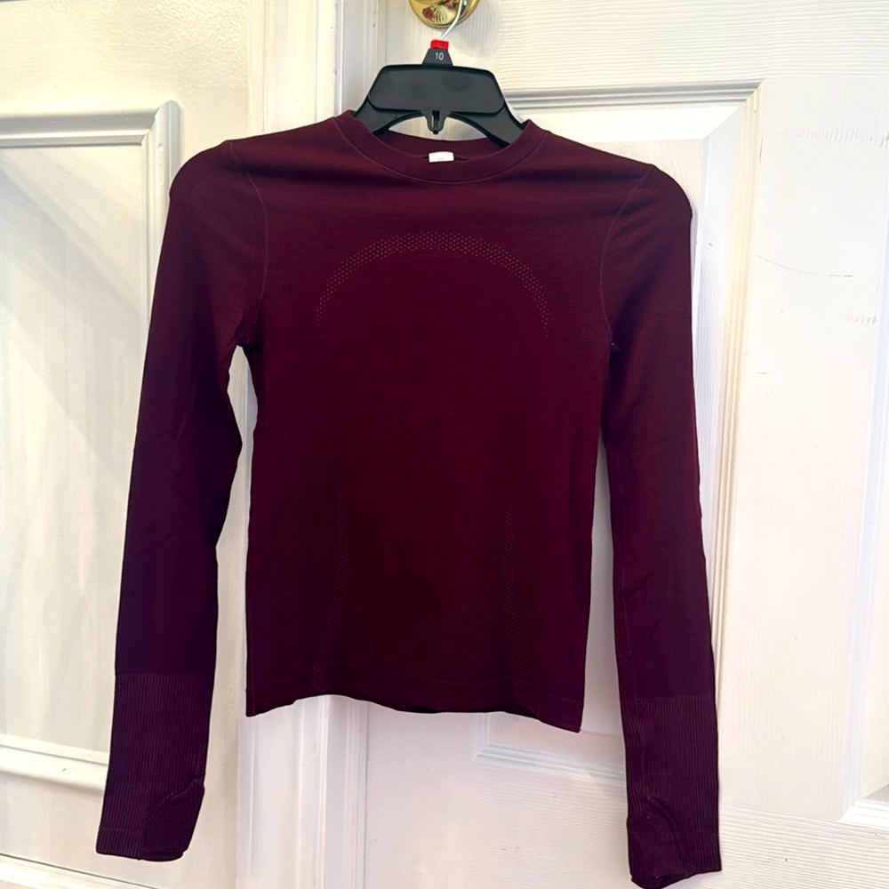 Lululemon maroon athletic top. Brand new without tags. Never worn